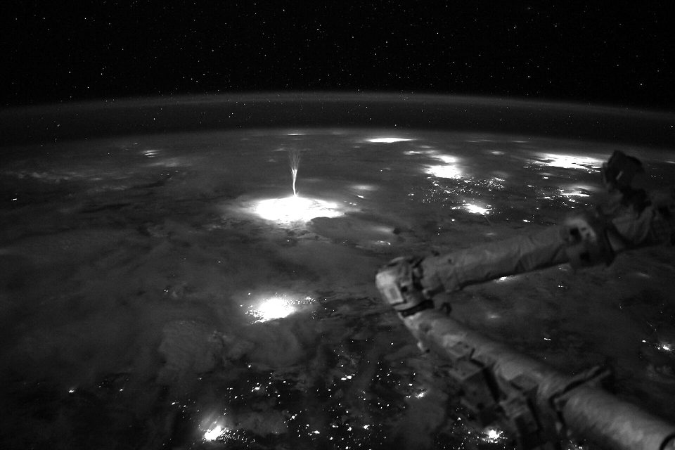 Gigantic jet photographed by Nichole Ayers on the International Space Station, some edits