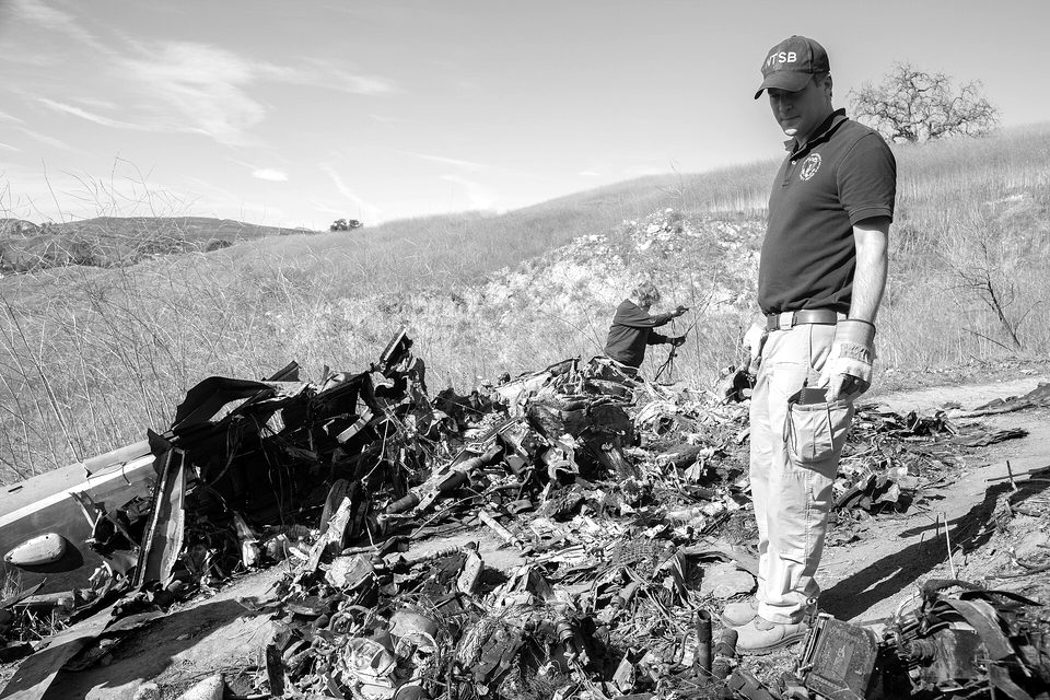 NTSB investigators Adam Huray and Carol Hogan