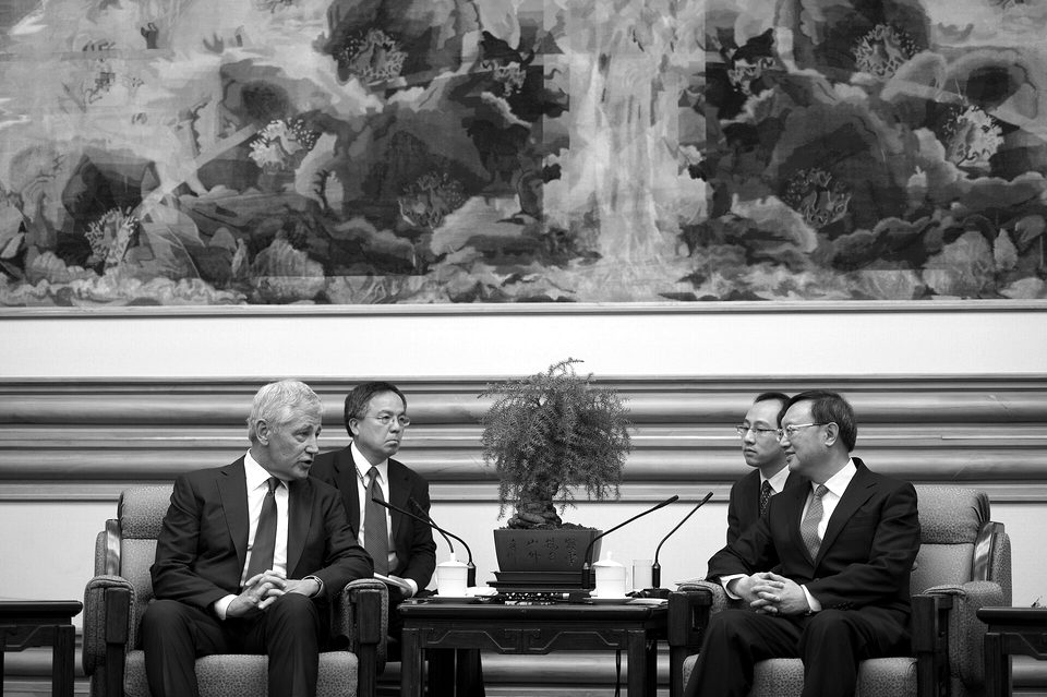 U.S. Defense Secretary Chuck Hagel greets Chinese State Councilor Yang Jiechi at Zhongnanhai in Beijing, April 9, 2014 140409-D-BW835-787